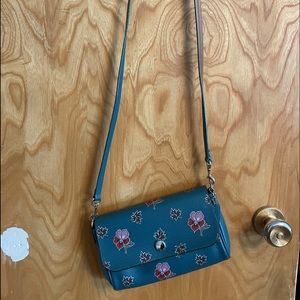 Flowered coach cross body bag